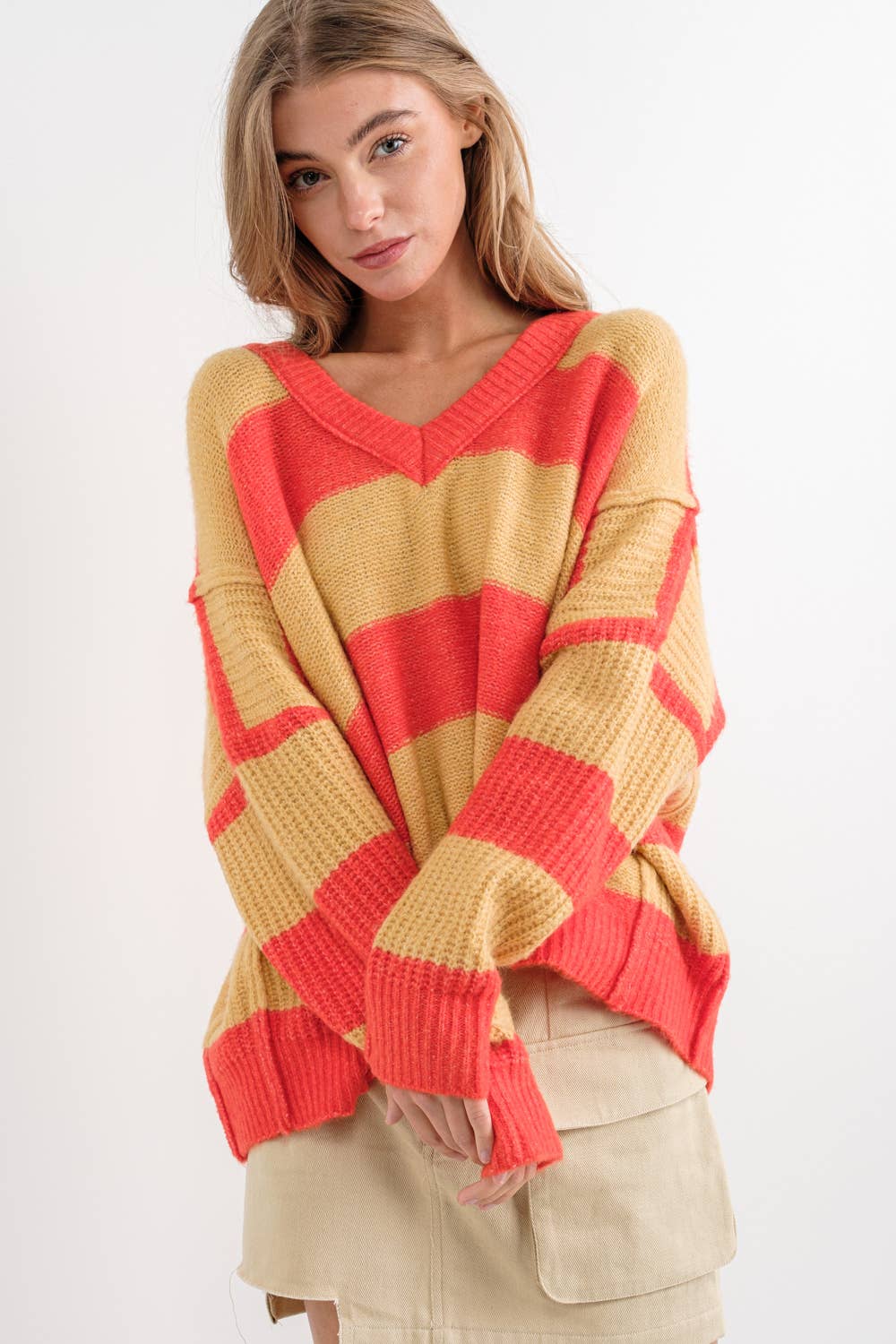 ARANCIO/TORTORA MAGLIONE DOLMAN OVERSIZE A RIGHE CON SCOLLO A V in vendita all'ingrosso su Faire2