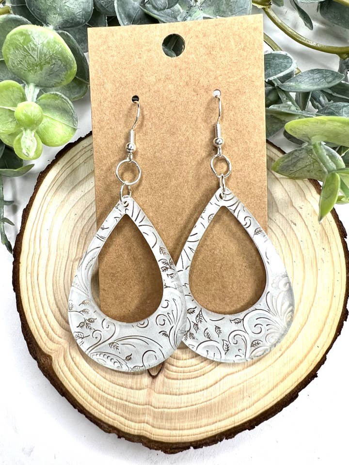 White Swirl Open Teardrop Acrylic Earrings for wholesale by Lindsey Lane Wholesale