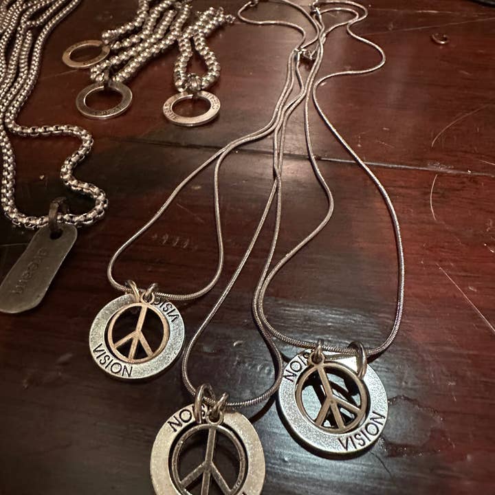Isolde Necklace (Vision + Peace) and other Purchase Wholesale isolde. Free Returns & Net 60 Terms on Faire trending on Faire.