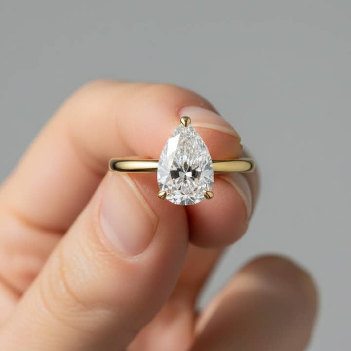 14K Solid Gold 3 Prong Pear Cut Solitaire Diamond Ring - IGI Certified for wholesale by Triple C Diamonds