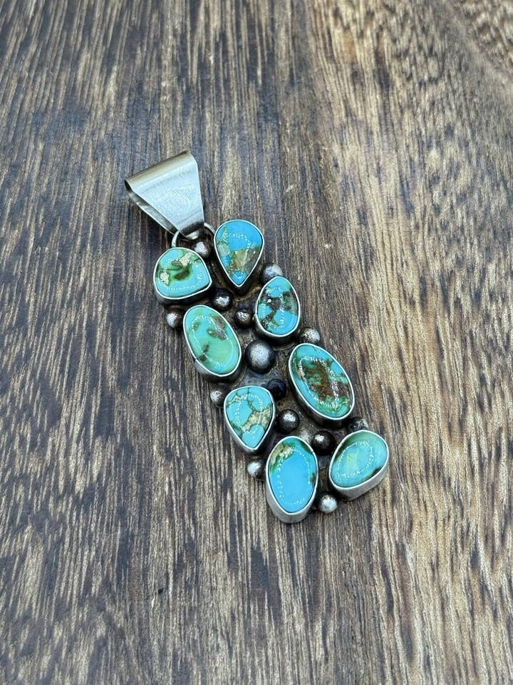 Navajo handgjord hängsmycke i sterlingsilver med Sonoran Gold turkoskluster för wholesale av Native City Jewelry