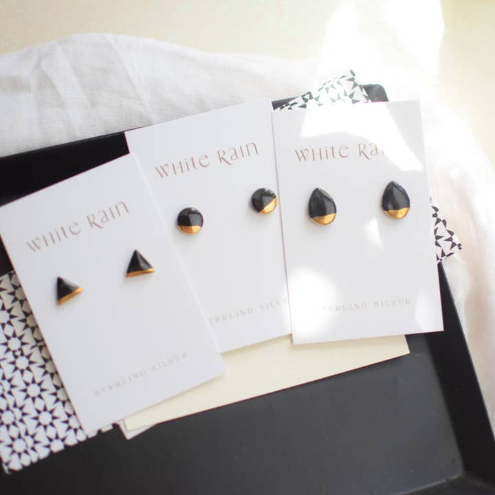 Svarta keramiska stift med guldglans för wholesale av White Rain Ceramics