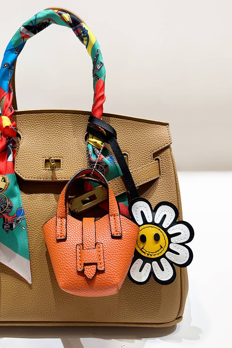 WHT Happy Flower Face Faux Leather Strap Bag Charm for wholesale on Faire1