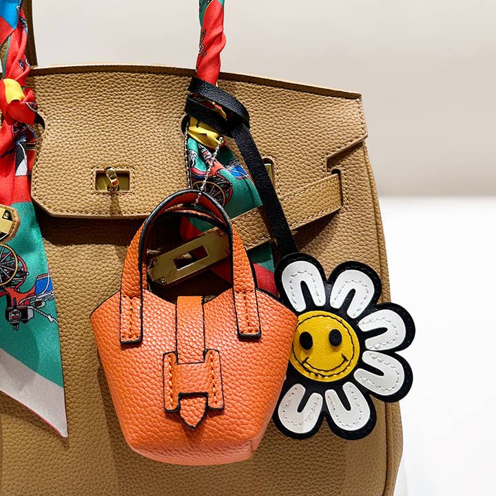 WHT Happy Flower Face Faux Leather Strap Bag Charm for wholesale on Faire1