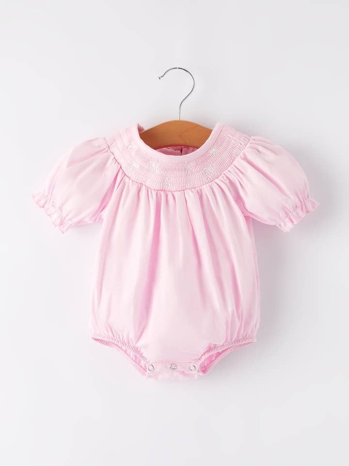 White Bow Smock Embroidered Pink Romper for wholesale by Rylee Faith Designs