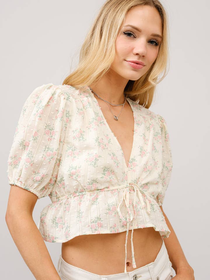 99150T - Puff Sleeve Tie Front Peplum Top for wholesale by Blue B