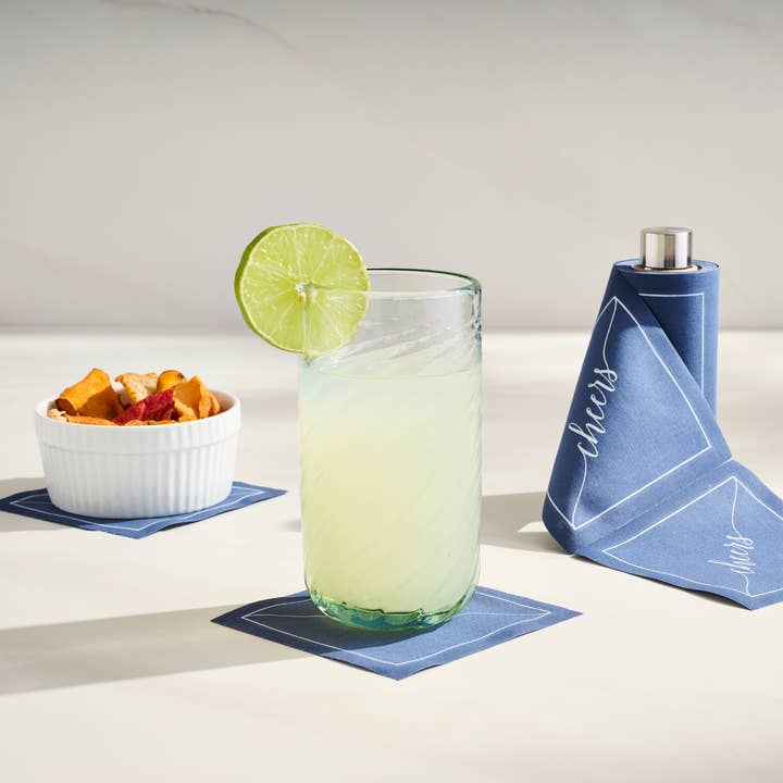 Table Theory (Formerly Toasting with Tara) – wholesale Disposable napkin – Cotton Cocktail Napkin Roll: Mystic Blue - White "Cheers"4