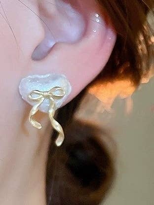 3D GOLD BOW HEART STUD EARRINGS | 40E362 for wholesale by JOSSLYN by wall to wall