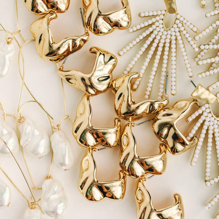 St Armands Designs of Sarasota – Engroshandel Hængeøreringe og creoløreringe – Statement-øreringe med hvid solstråle3