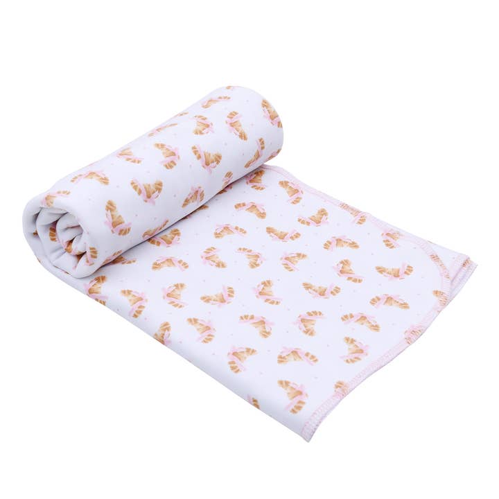 Petit Croissant Print Swaddle Blanket for wholesale by Magnolia Baby