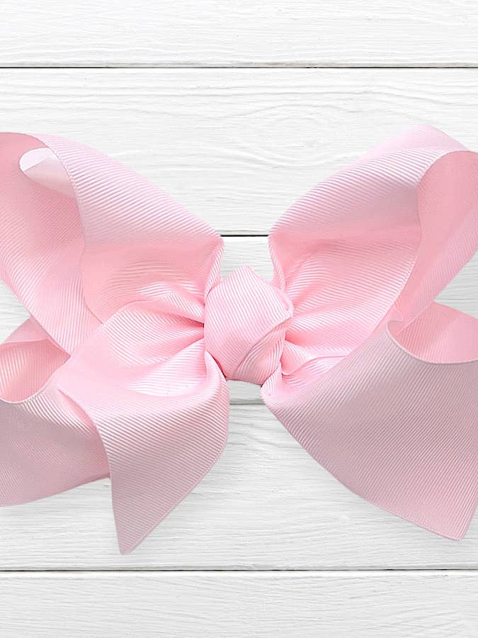 POWDER PINK SOLID 7.5" WIDE HAIR BOWS. BW-115-P 12PCS/$18 for wholesale by Kids Charm Online