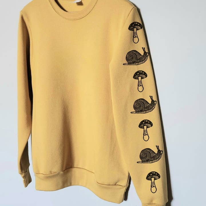 Snail mushroom sweatshirt with sleeve print, hand printed unisex crewneck, forest design, block print cottagecore jumper, ethical fashion for wholesale by M.E. Image