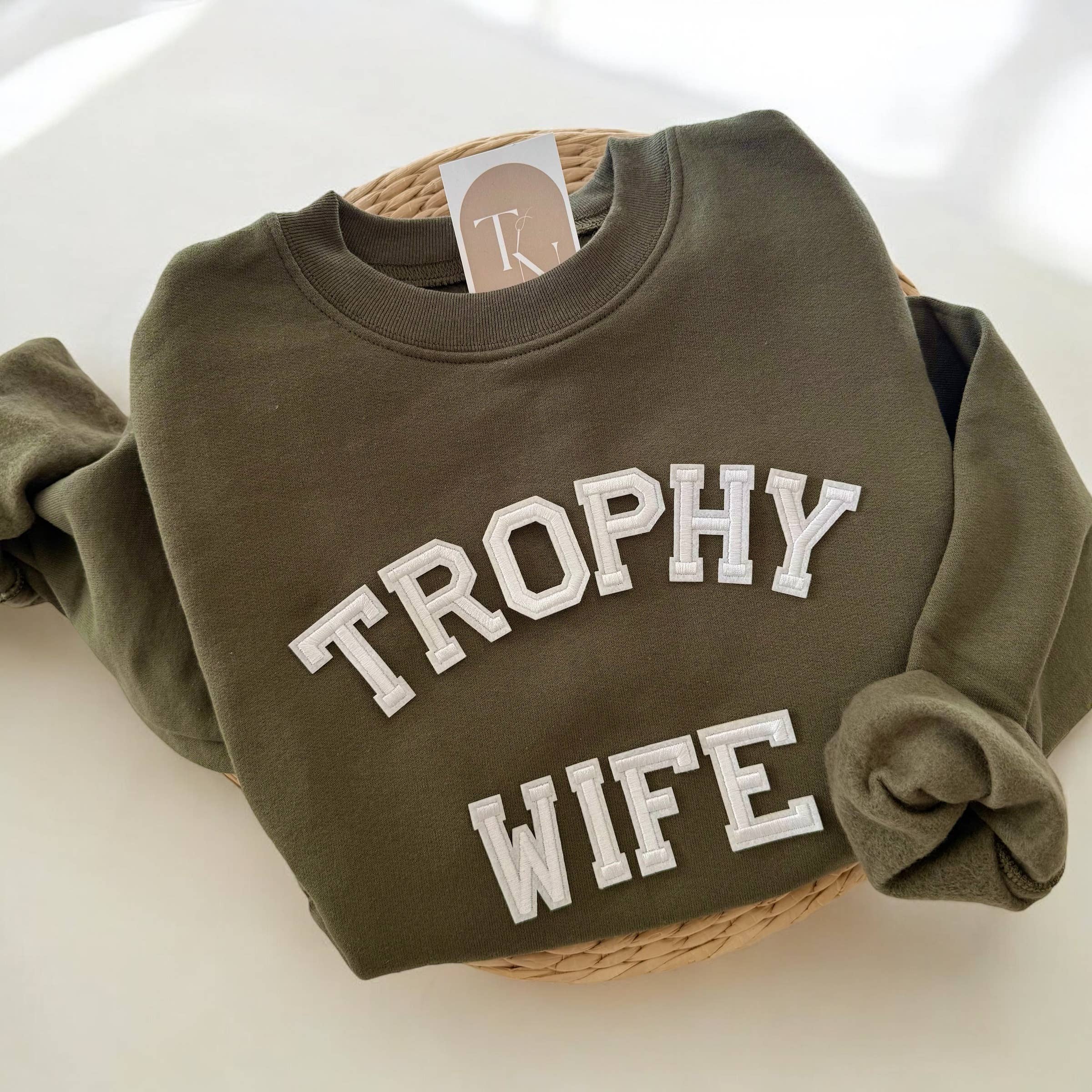 Threads And Needles, INC. - Wholesale Sweatshirt - Women's - TROPHY WIFE Sweatshirt, Funny Sweatshirts for Women1