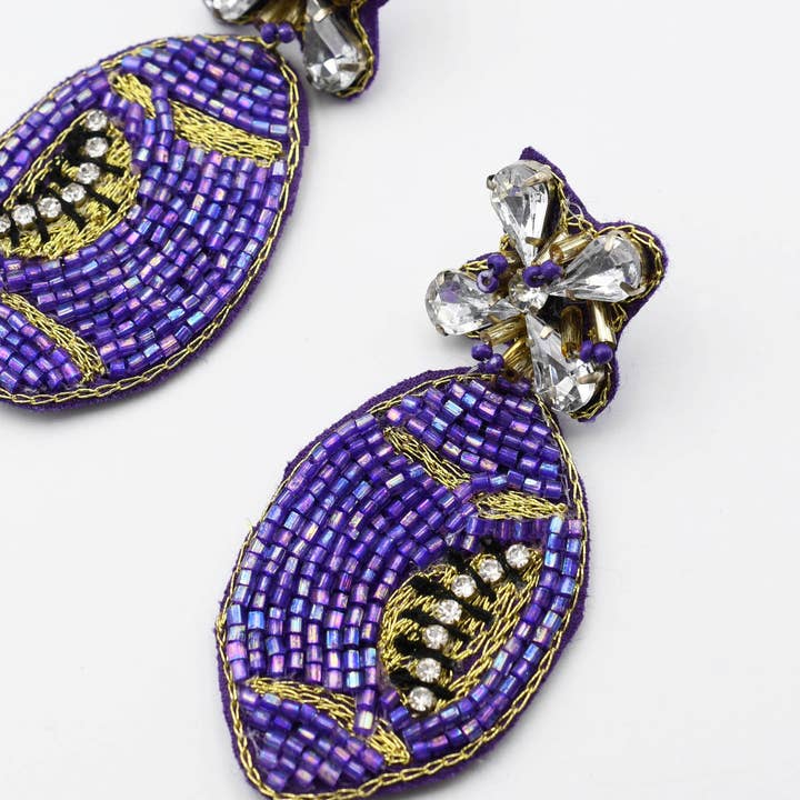 Purple Football Beaded Earrings for wholesale by Treasure Jewels Inc.