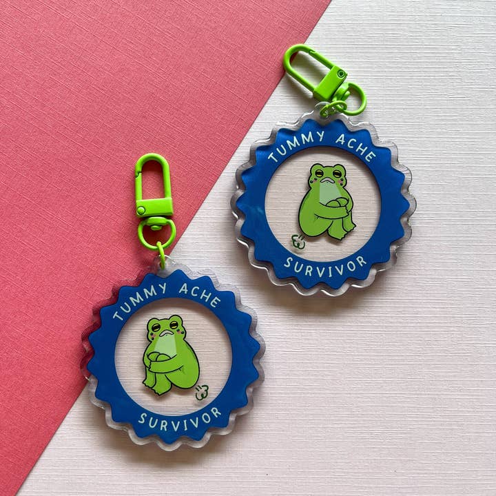 Porte-clés Grenouille Survivor Ache Tummy Ache pour la vente par Frogblobs