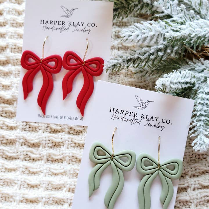 The Bow Dangles- Polymer Clay Christmas Earrings and other Purchase Wholesale final haarspray. Free Returns & Net 60 Terms on Faire trending on Faire.