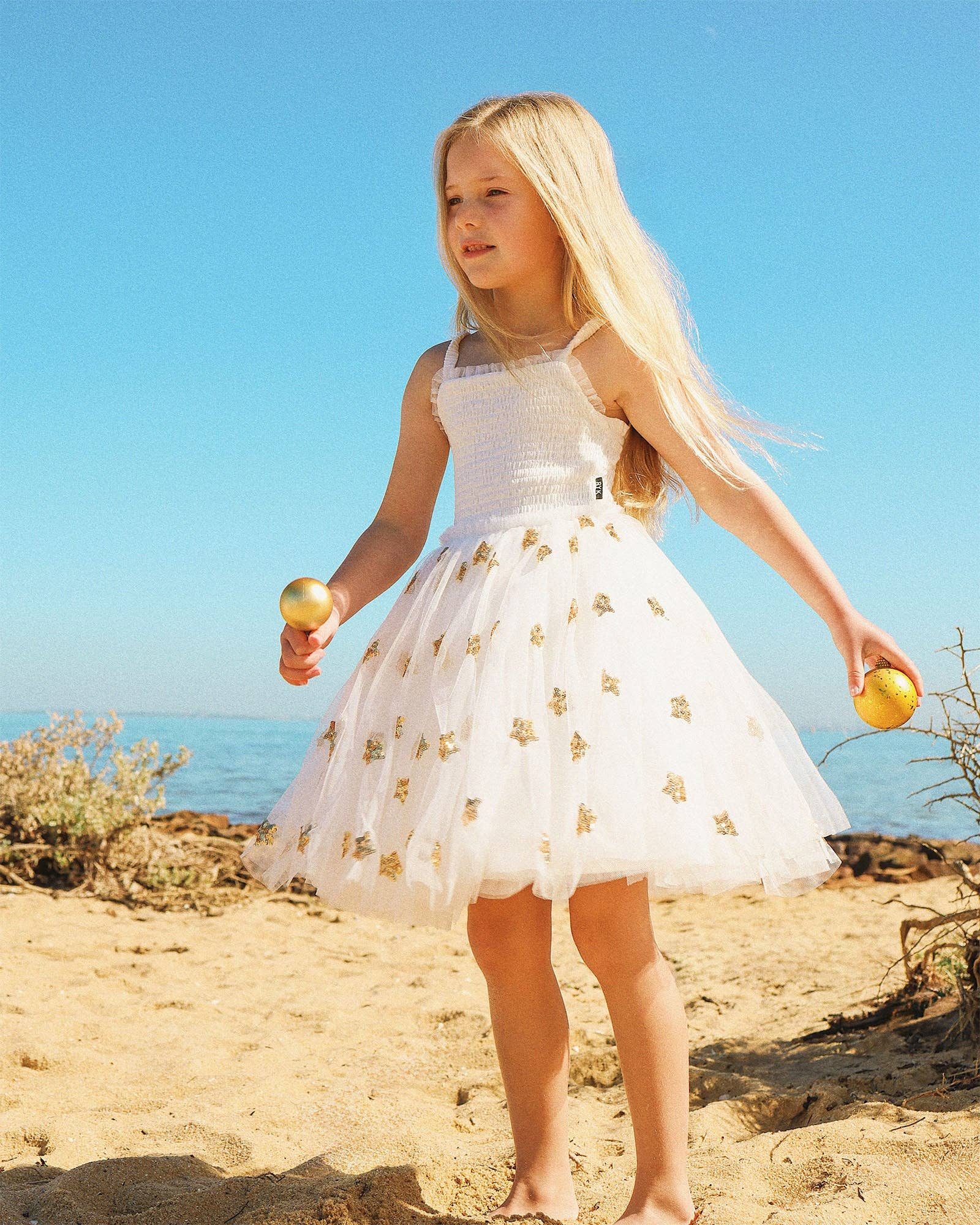 WISHES TULLE DRESS IN SNOW CONE STARS for wholesale on Faire