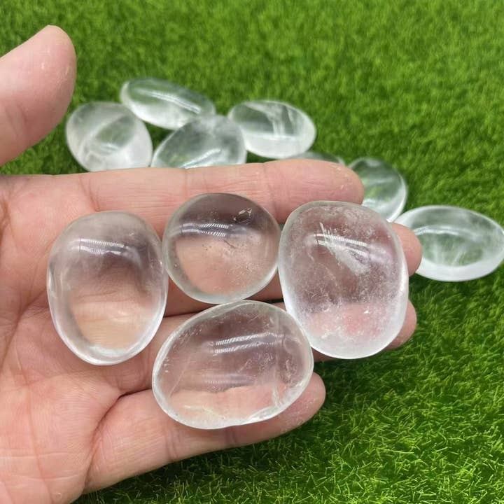 Clear Quartz Shape Round Palm Stones (1.3-1.8") for wholesale by Crystal Deal· Wholesale Crystals & Gifts