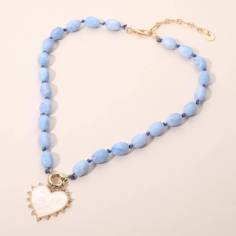 Sensibling Corp. – wholesale Pendant/charm necklace – Mother of Pearl Heart Pendant Marbled Resin Oval Beaded Necklace4