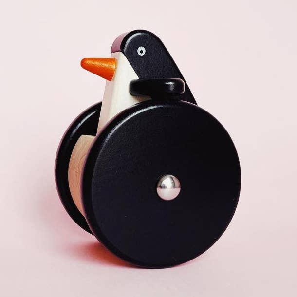 Wooden Penguin on Wheels (Wobbly) for wholesale by BAJO WOODEN TOYS