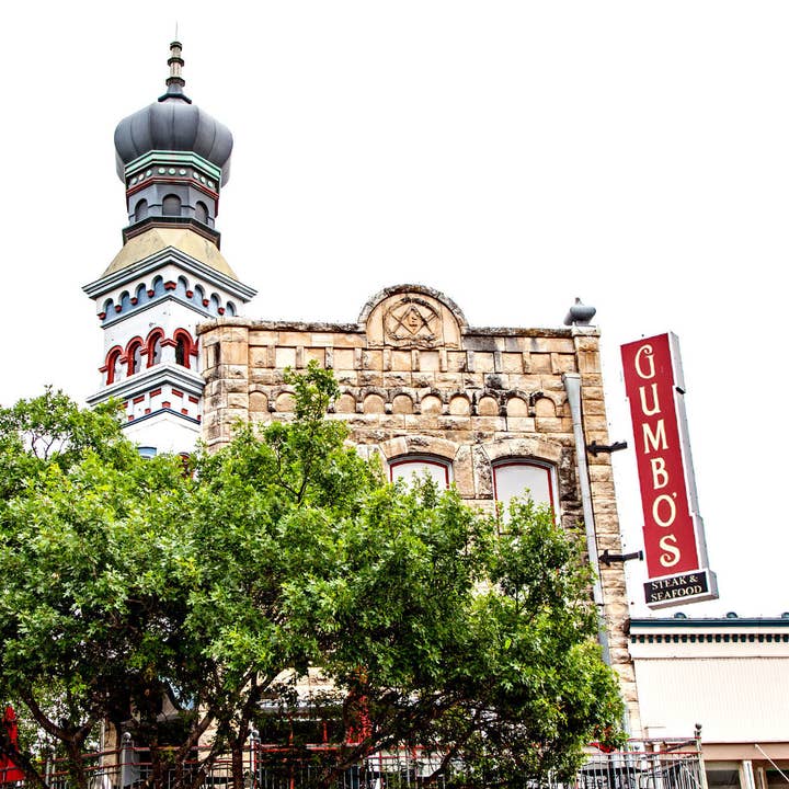 Gumbo's North on the Square Ceramic Coaster for wholesale by South Austin Gallery