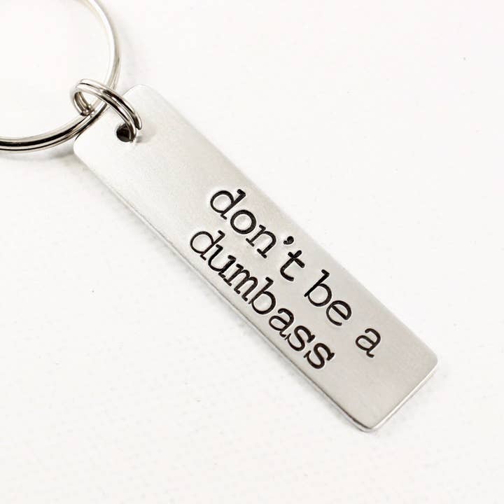 "don't be a dumbass" Hand Stamped Keychain for wholesale by Completely Hammered