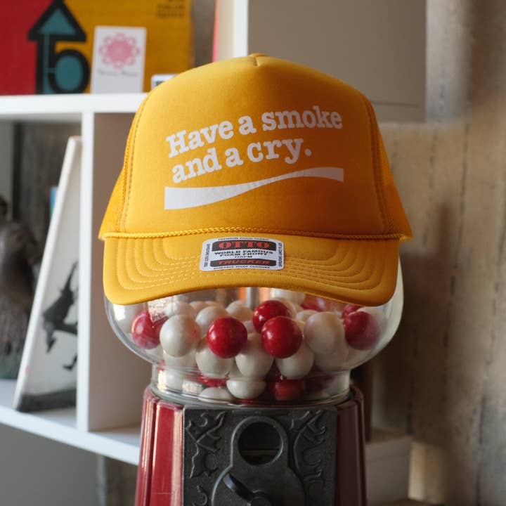 Have A Smoke And A Cry Foam Trucker Snapback Hat (Golden Yellow) for wholesale by NORMAN ROSCOE