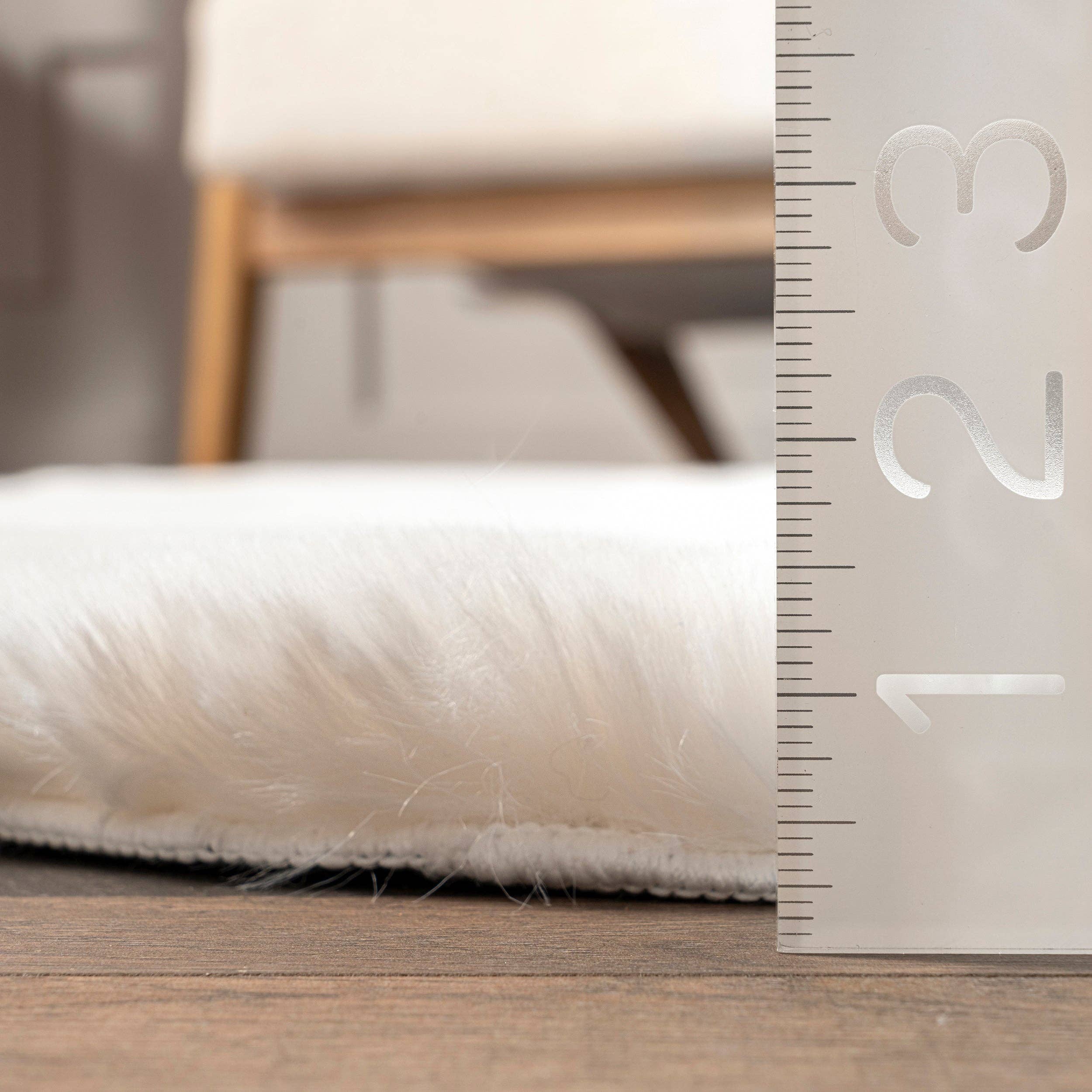 White Eline Faux Sheepskin Machine Washable Area Rug for wholesale on Faire2