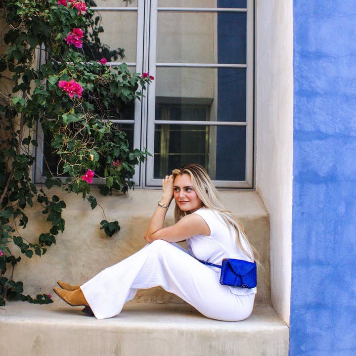 Blue Mini Tassels Leather Belt Bag and other Purchase Wholesale prezzo adblue al litro. Free Returns & Net 60 Terms on Faire trending on Faire.