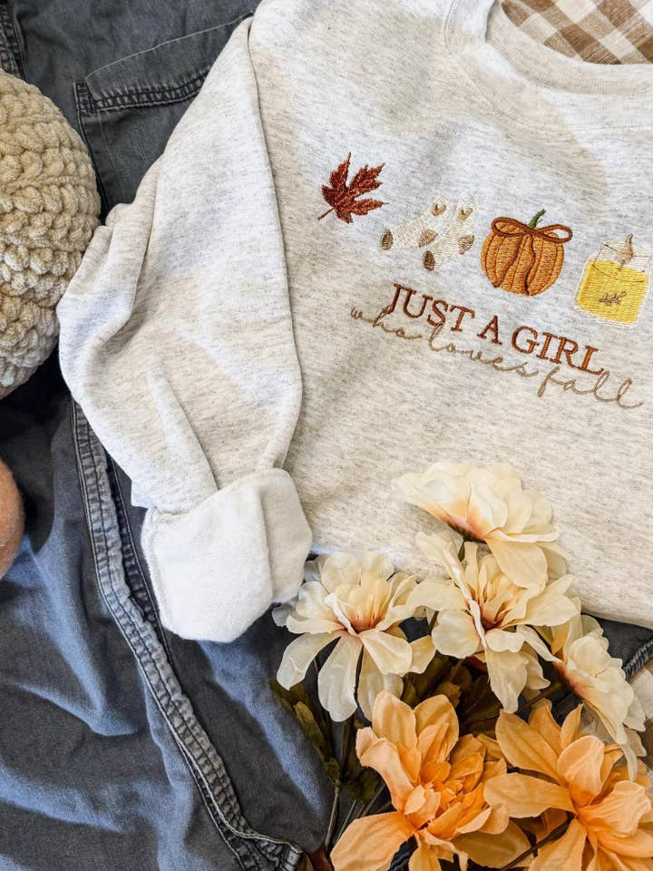 Just a Girl who loves Fall Embroidered Crewneck for wholesale by Lilli Jane Stitches