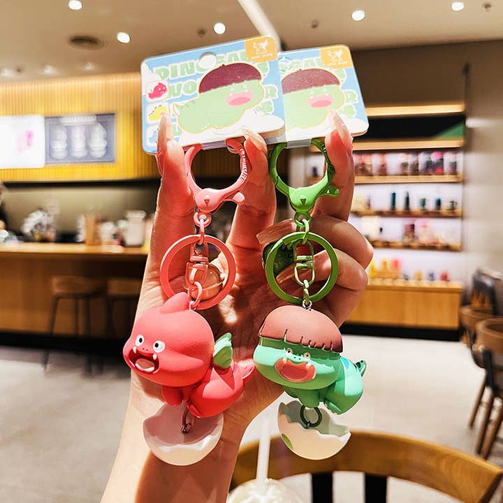 KiddieKickz - Wholesale Keychain – Child - Cartoon Dinosaur Holding Egg PVC Soft Keychain3