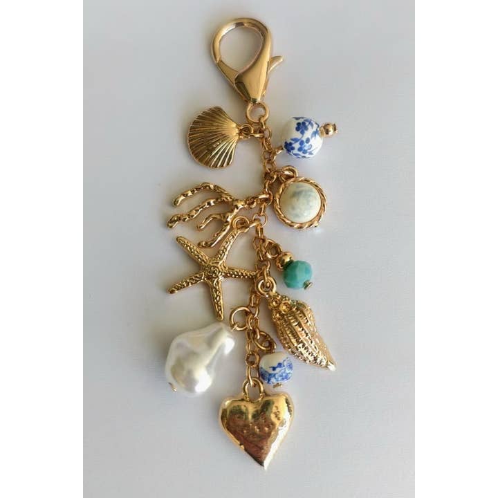 Gold PORCELAIN SEA LIFE PEARL HEART TURQ BEAD BAG CHARM | 80K009 for wholesale on Faire2