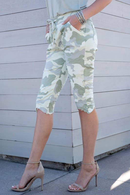 CAMOUFLAGE CRINKLE FRINGE HEM BERMUDA SHORTS (58381-CAMO) for wholesale on Faire2