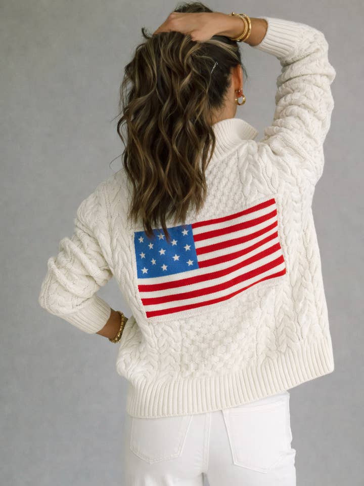 Pull à col zippé 1/2 en câble ivoire pour la vente par Pink Pineapple