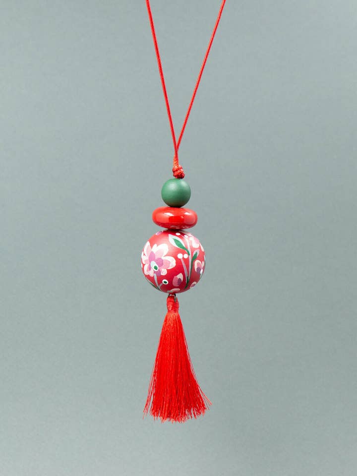 Magische hanger met rode kralen voor wholesale door Gannwood