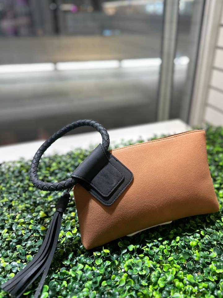 BP204SU Faux Suede Cuff Handle Tassel Wristlet/Clutch and other Purchase Wholesale bp339j. Free Returns & Net 60 Terms on Faire trending on Faire.