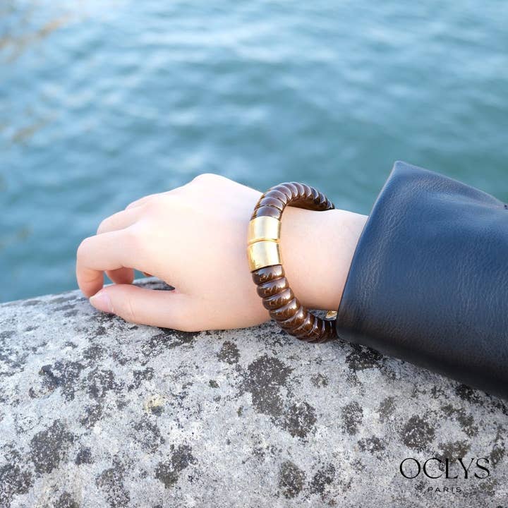 Uji gold stainless steel magnetic bangle resin bracelet for wholesale by Oclys