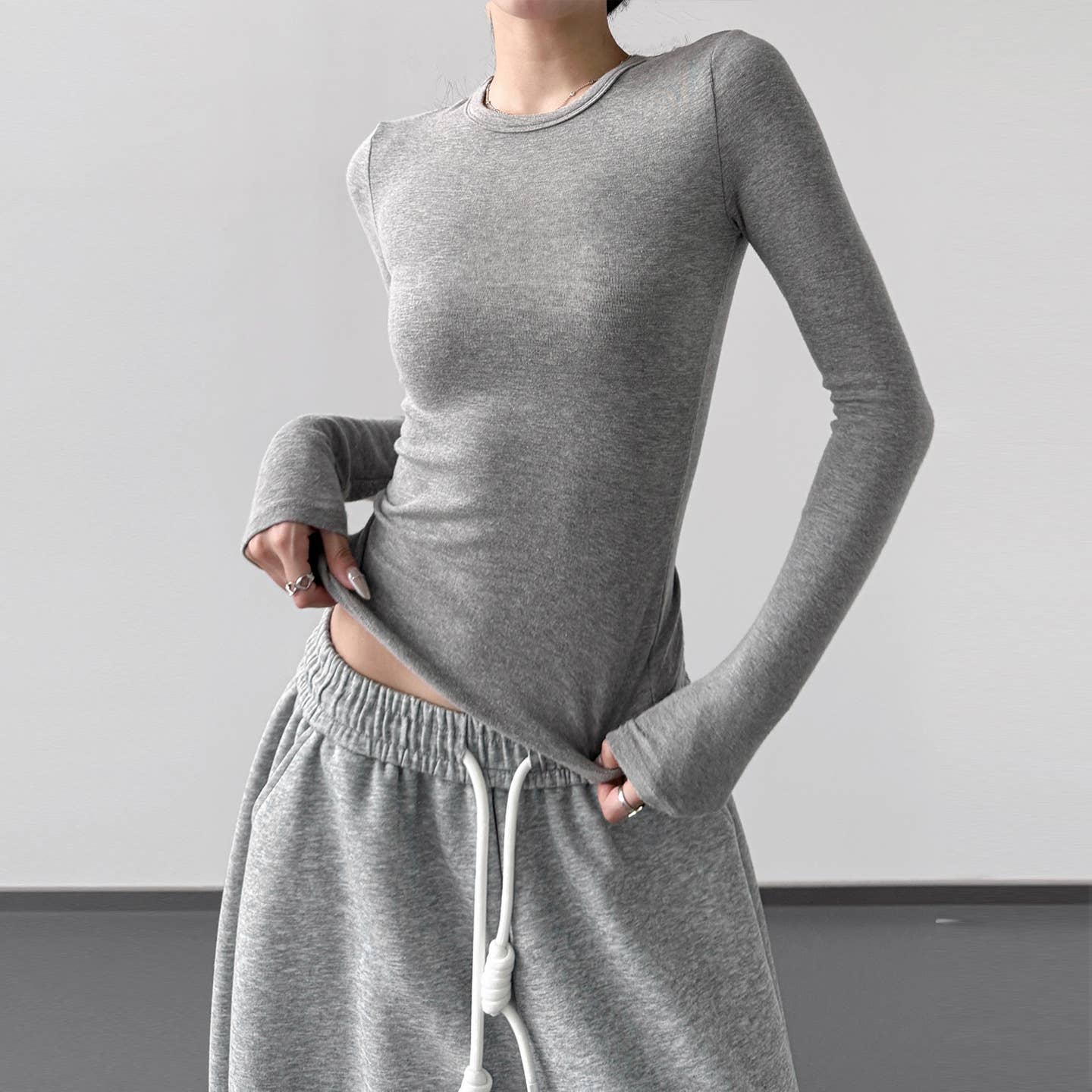 UZ Wholesale Store - Vendita all'ingrosso Top in maglia - Donna - Maglietta a maniche lunghe aderente a tinta unita1