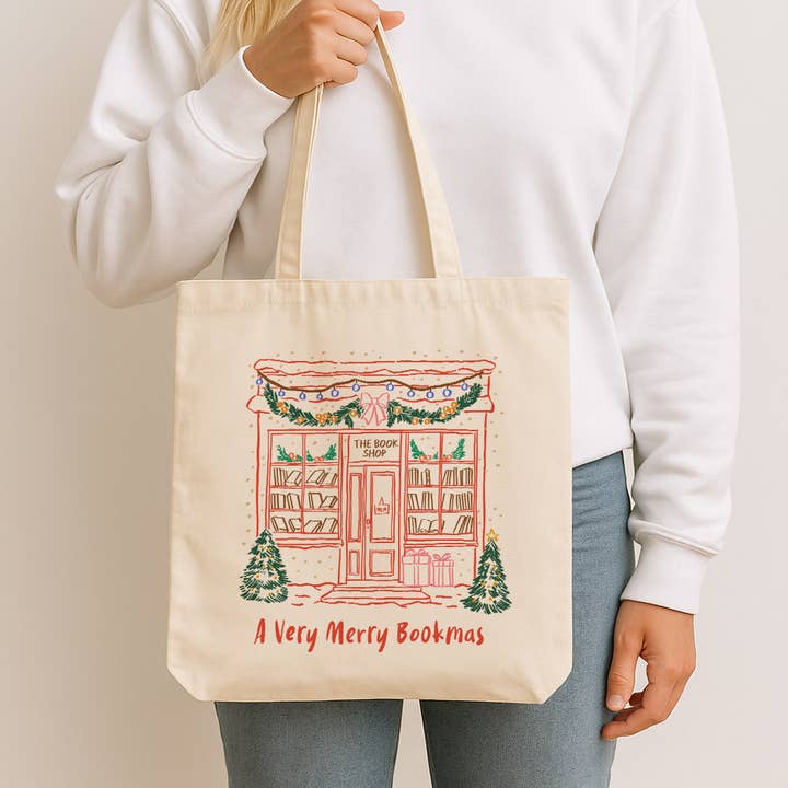 A Very Merry Bookmas Holiday Bookstore Canvas Tote Bag for wholesale by WhiteWolfeDesign
