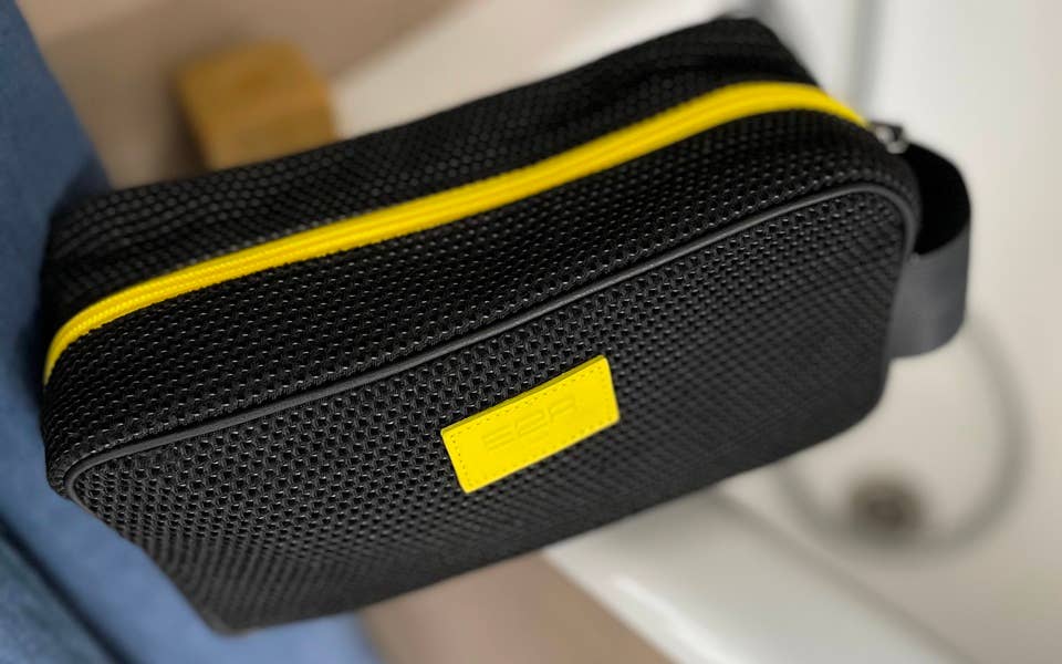 E2R PARIS - Wholesale Toiletry Bag - Men's - Black toiletry bag with white, yellow, grey leather stripes3