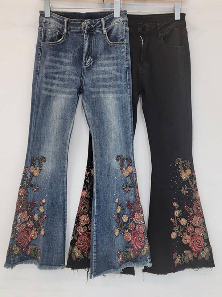 Jeans di denim con svasatura floreale per la vendita all'ingrosso da parte di Mccolin