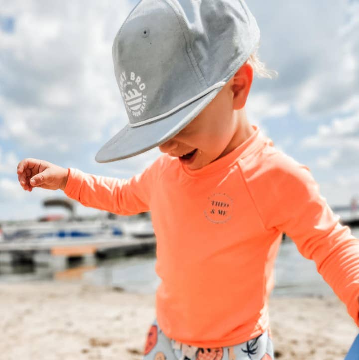 Baby Boys Toddler Swim Trunks - Retro Blue Orange Smiles for wholesale by Rufflеѕ & Bоwtіеѕ - Affordable Boys & Girls Clothing