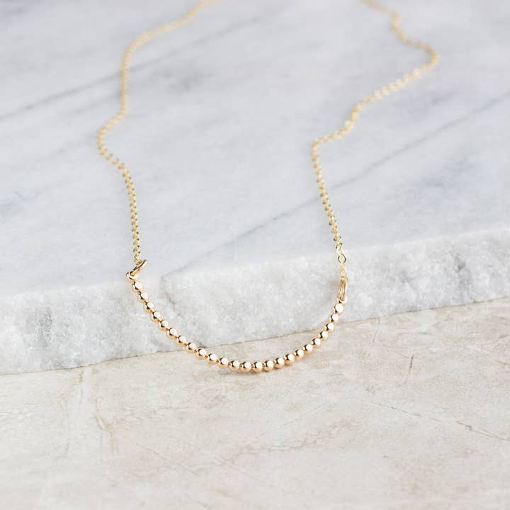 Dot Crescent Necklace for wholesale by mjöll