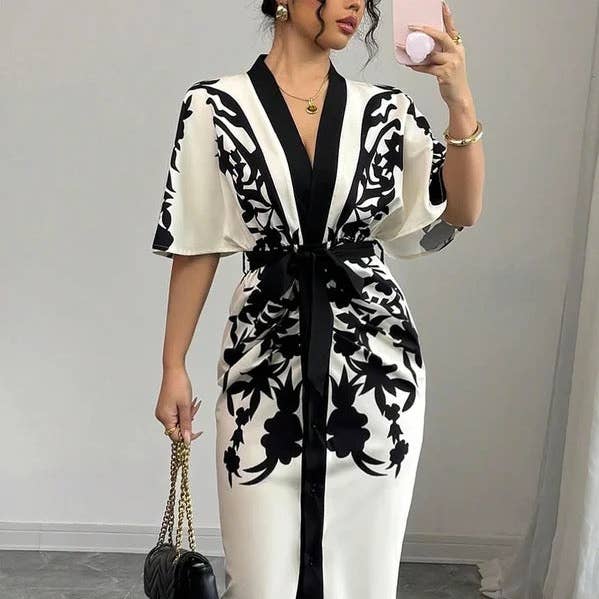 Robes mi-longues à manches courtes imprimé fleuri avec taille nouée et col en V pour la vente par UZ Wholesale Store