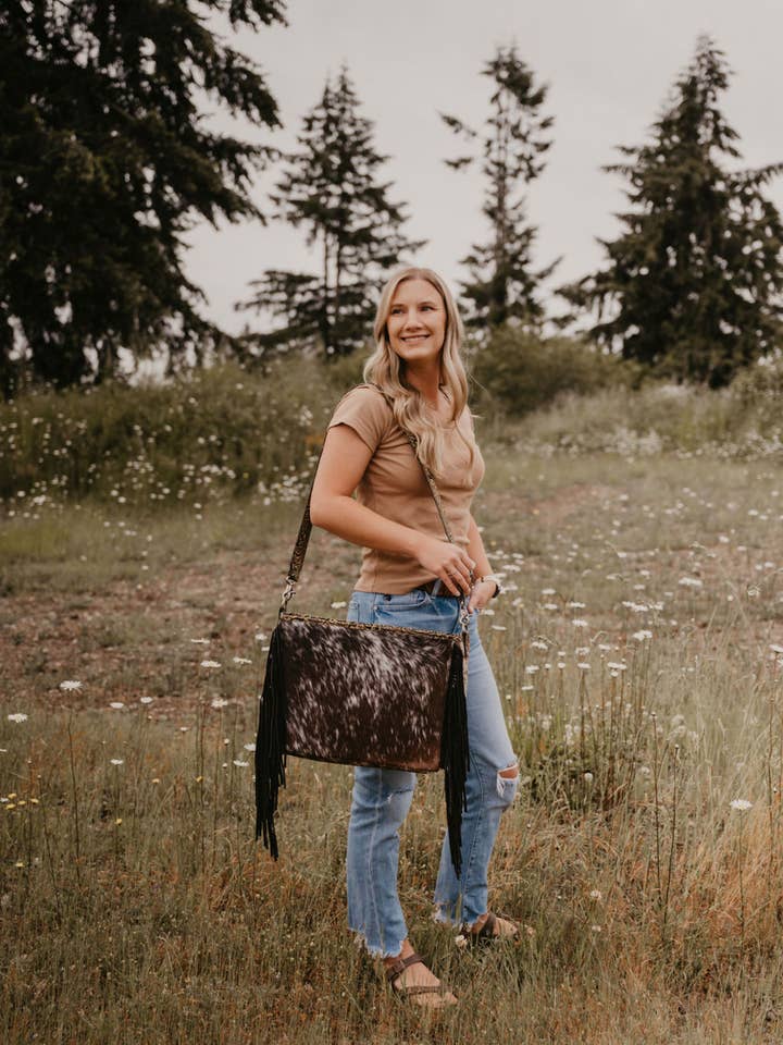 Large Cowhide messenger bag for wholesale by FRINGE & LUXE