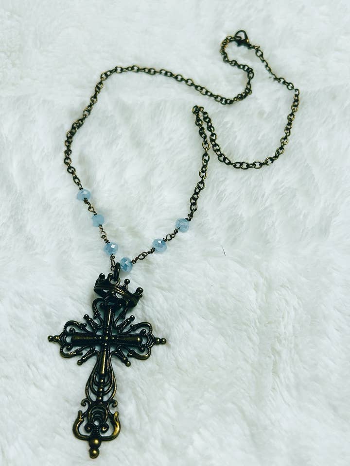 Brozne Crowned Cross Baby Blue Swarovski Necklace for wholesale by Petals Jewelry Designs By Brandi Crain