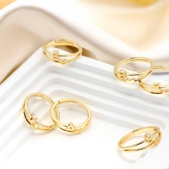 paquet de bague initiale cœur duo en or pour la vente par Cool and Interesting