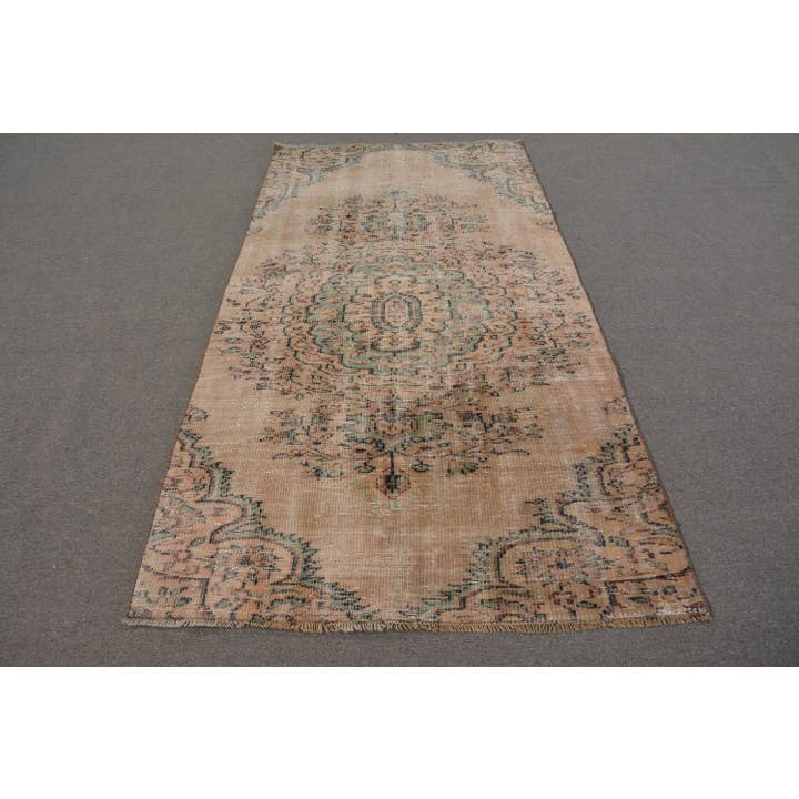 Vintage Handmade Wool Rug with Floral Motif for wholesale by The Loom Wholesale