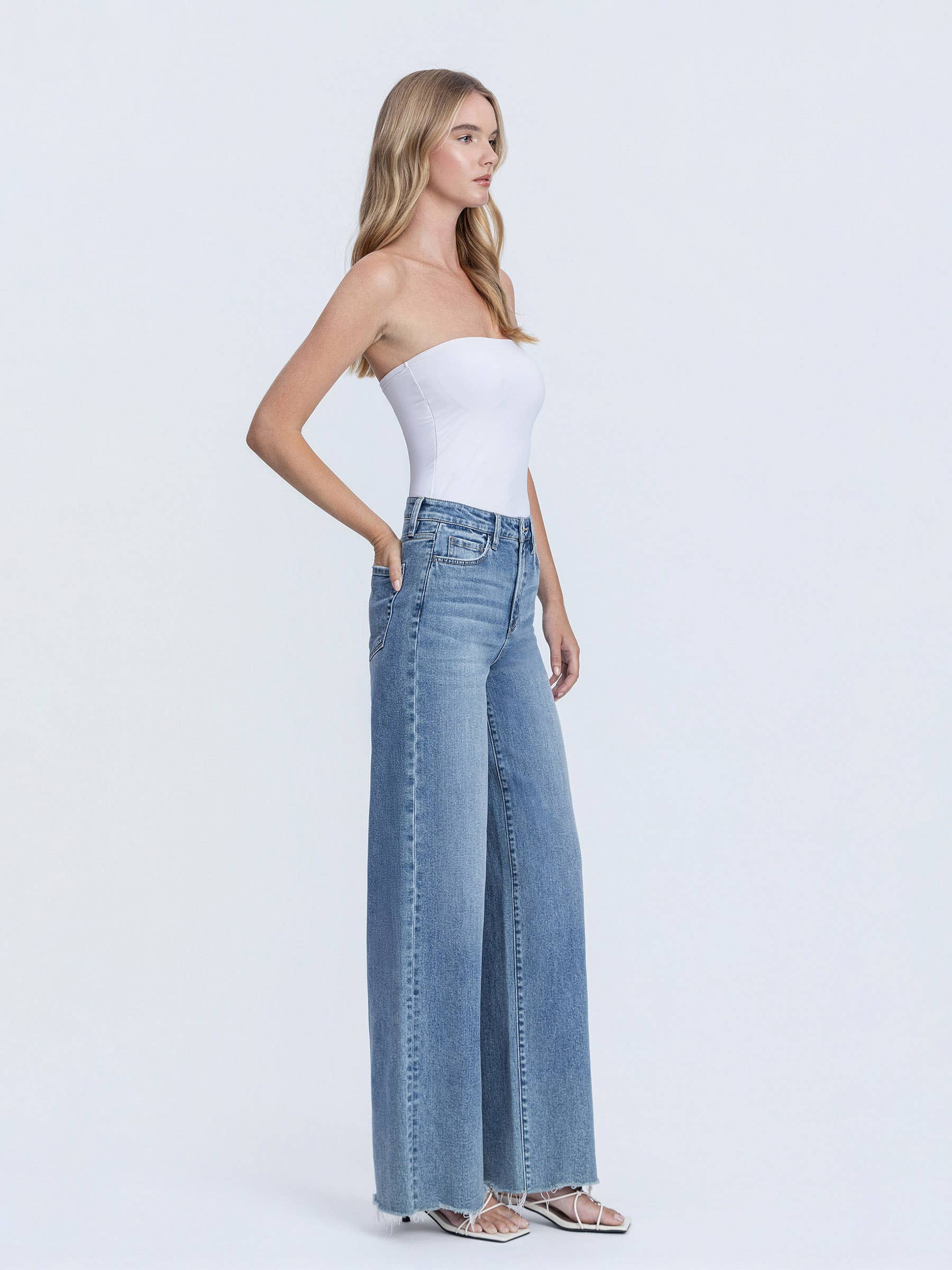 CLOSENESS SUPER HIGH RISE MEDIUM WASH RAW HEM WIDE LEG JEANS F6373 for wholesale on Faire3