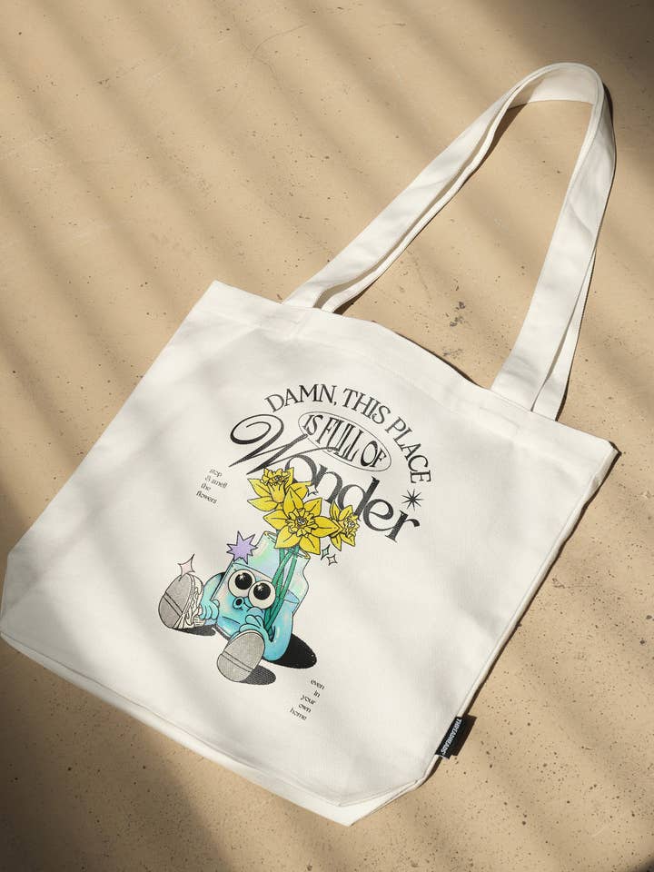 Damn This Place is Full of Wonder Tote Bag for wholesale by Threadheads